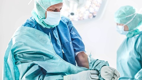 surgeon wearing BARRIER staff clothing