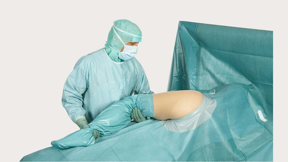 BARRIER ortopédiai lepedőt használó sebész 